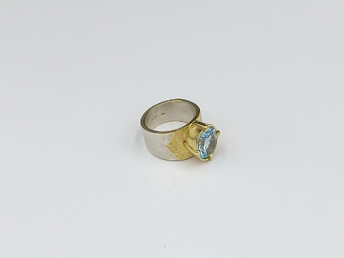 Silver Ring Anointed with Blue Topaz stone