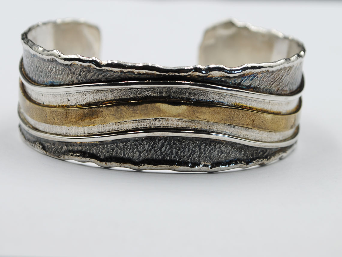 Silver bracelet oxidized with bronze