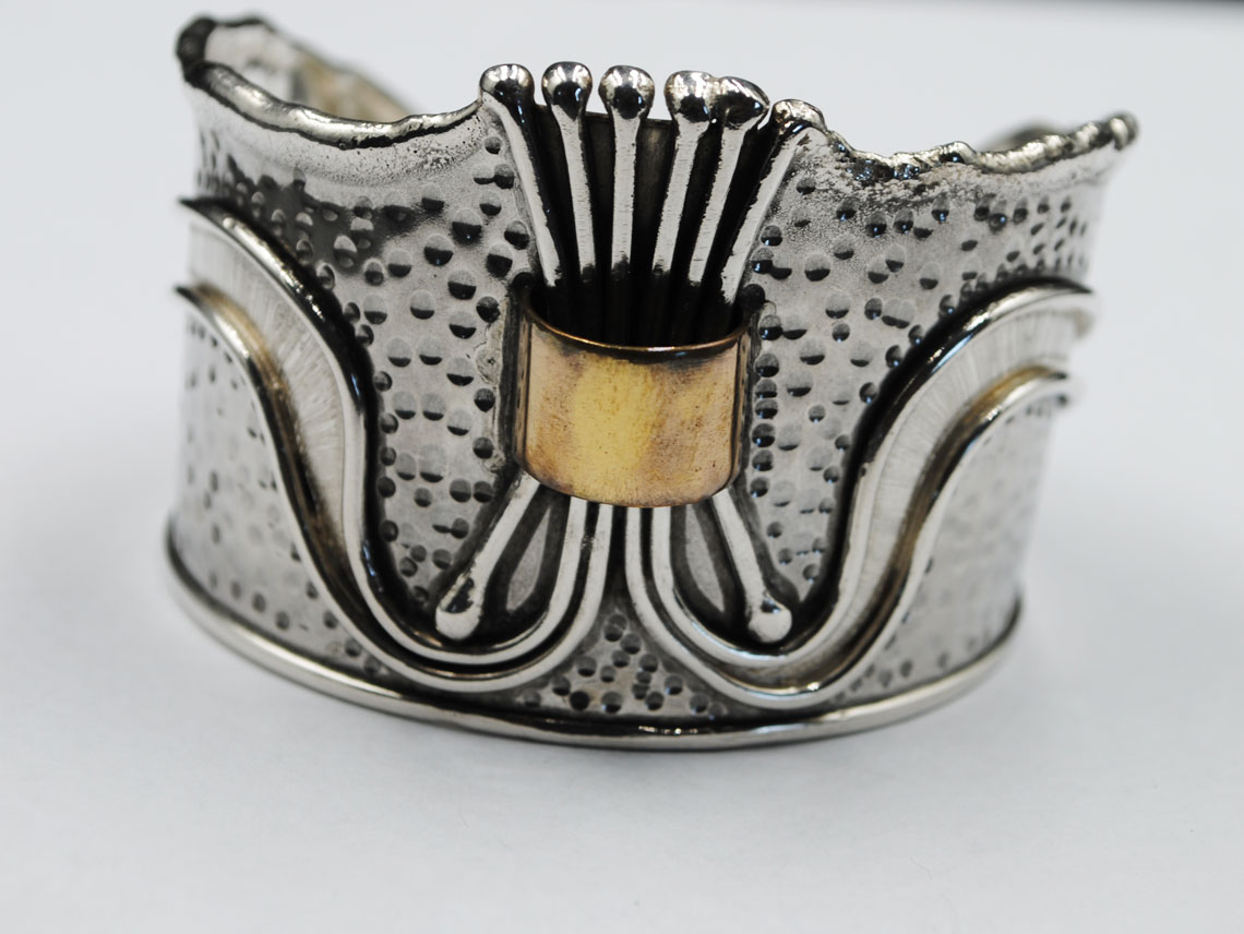 Silver bracelet oxidized with bronze