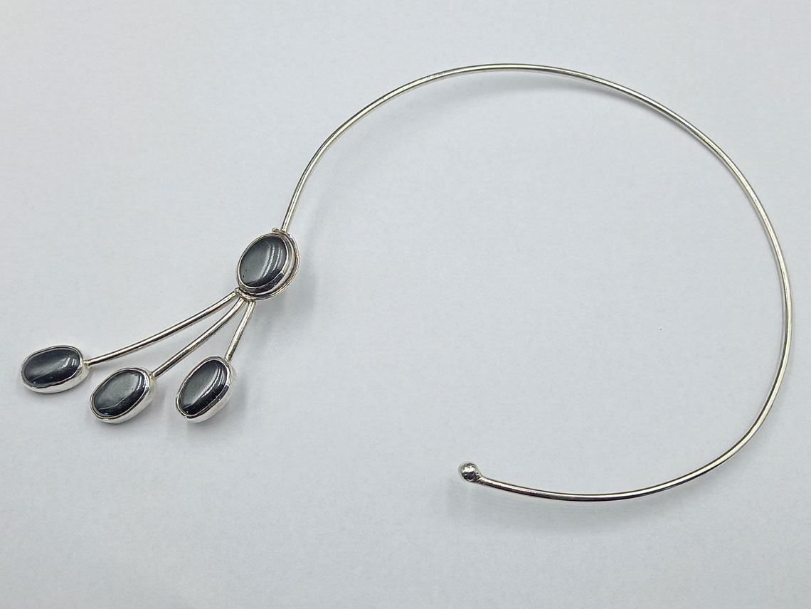 silver necklace with hematite stone
