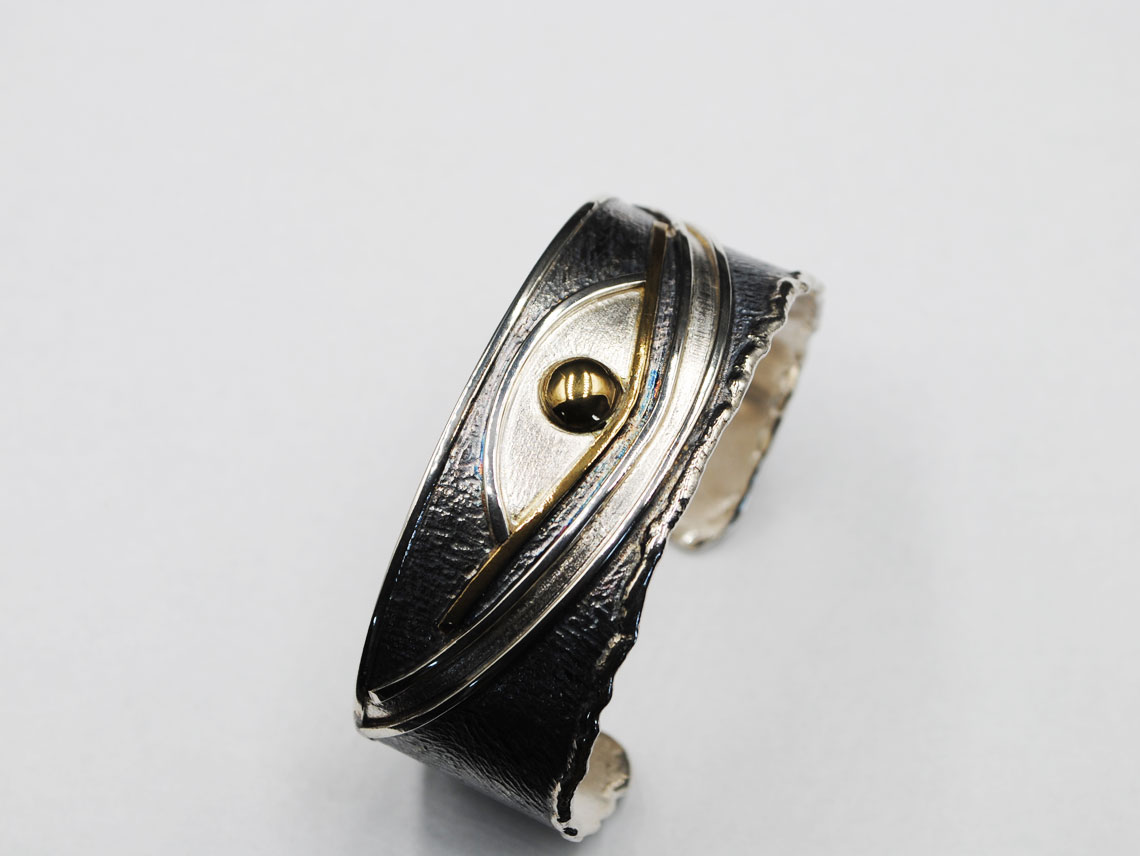 Silver bracelet oxidized with bronze